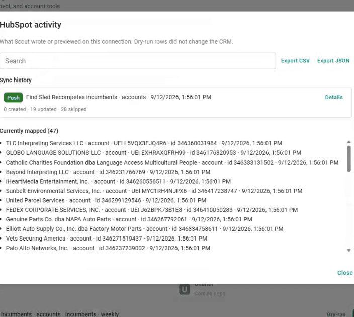 HubSpot activity log in SCOUT listing mapped company records and a recent push